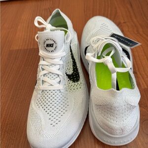Nike White and Black Flyknit Sneakers